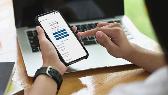 Cropped image of hands are using an empty screen smartphone at t
